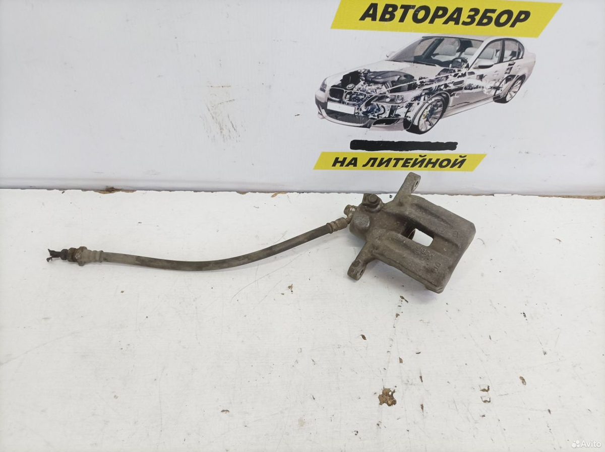 Суппорт тормозной задний правый Hyundai IX35