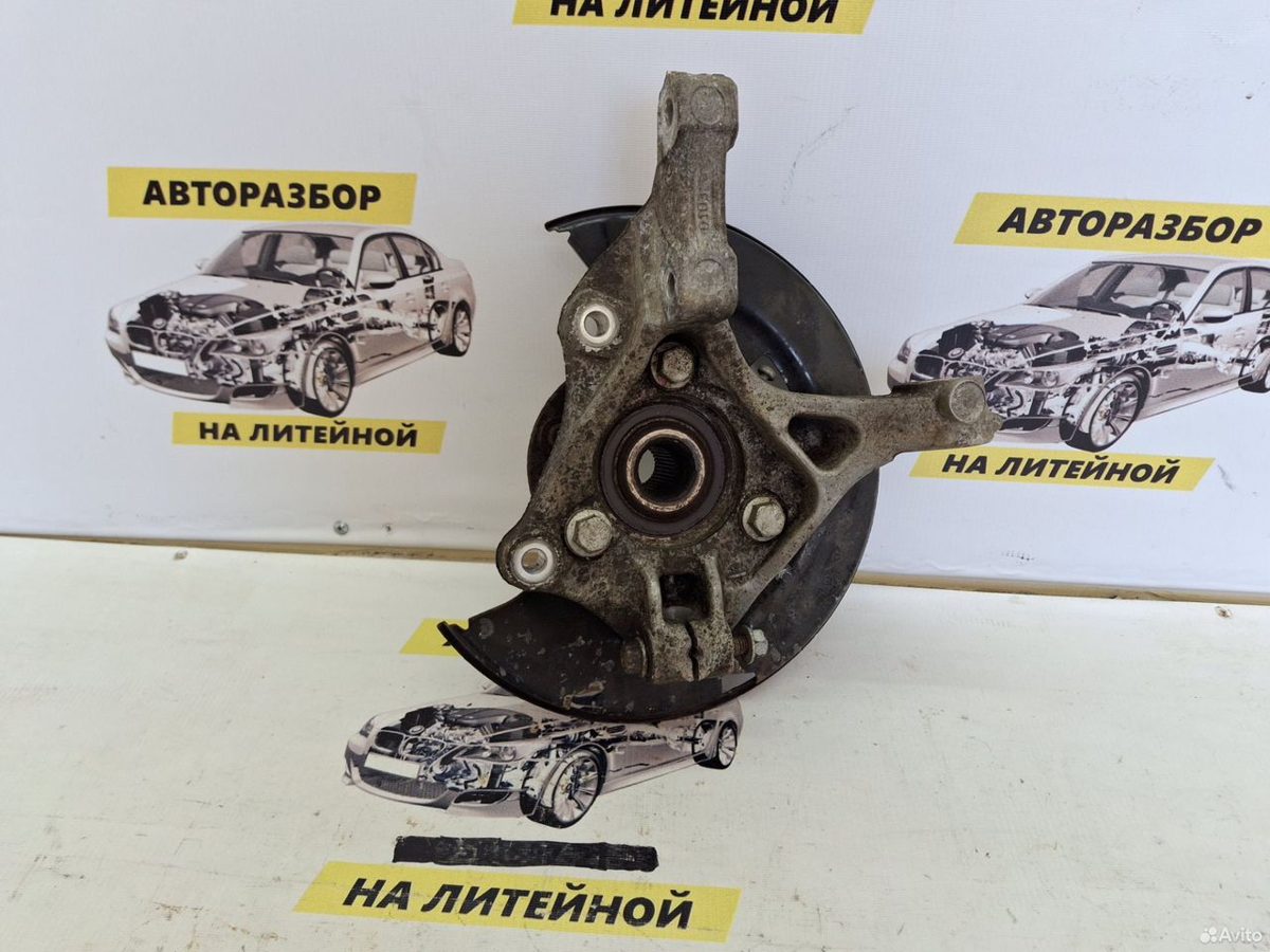 Кулак поворотный правый Chevrolet Cruze J300